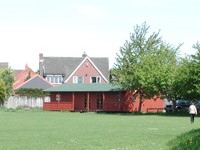 The new pavilion for the Glebelands members, but that is a house behind - not a second storey!