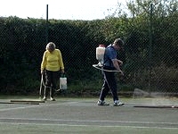 Volunteers killing moss 2006